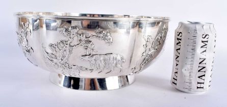 AN UNUSUALLY LARGE 19TH CENTURY CHINESE EXPORT SILVER LOBED BOWL by Luen Wo, decorated in relief