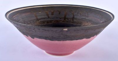 A STYLISH ENGLISH STUDIO POTTERY FLAMBE CONICAL FORM BOWL in the manner of Lucie Rie. 22.5 cm