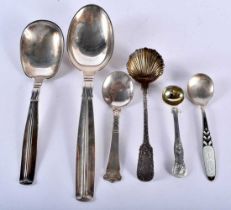 FOUR DANISH SILVER SPOONS together with two George III silver spoons. 266 grams. Largest 25 cm long.
