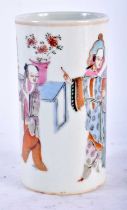 A 19TH CENTURY CHINESE FAMILLE ROSE PORCELAIN BRUSH POT Qing, painted with figures within an
