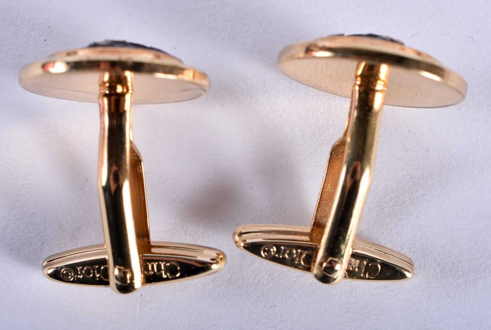 A pair of gold tone enamel cufflinks by Christian Dior (15g) - Image 4 of 4