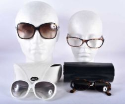Three Pairs of Sunglasses (Prada, Guggi and Bvlgari) and another pair. Bvlgari and Pucci have