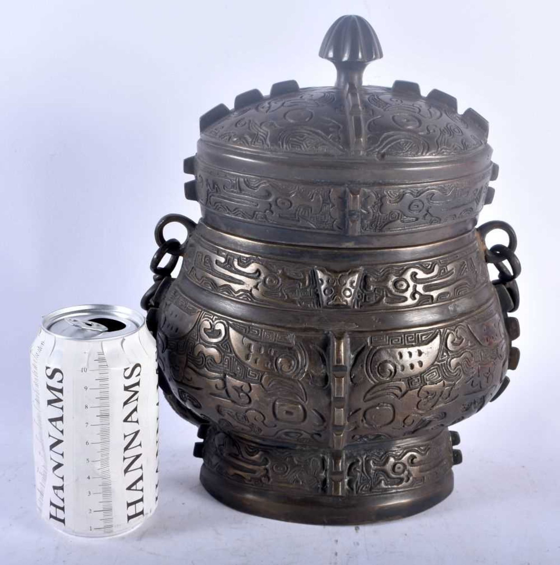 A LARGE LATE 19TH CENTURY CHINESE BRONZE ARCHAIC VESSEL AND COVER Late Qing, modelled with taotie