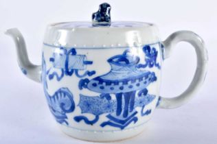 A GOOD 17TH CENTURY CHINESE BLUE AND WHITE PORCELAIN TEAPOT AND COVER Kangxi, of barrel form,