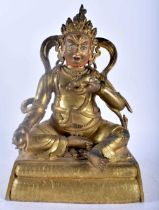 A FINE CHINESE TIBETAN QING DYNASTY GILT BRONZE FIGURE OF A SEATED BUDDHA modelled holding a rat and
