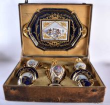 A FINE AND RARE CASED LATE 19TH CENTURY FRENCH SEVRES PORCELAIN CABARET TEA FOR TWO TEASET painted