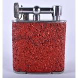 A Dunhill style Jumbo lighter contained in a Mottled Red Texture effect case, patent no.286838.
