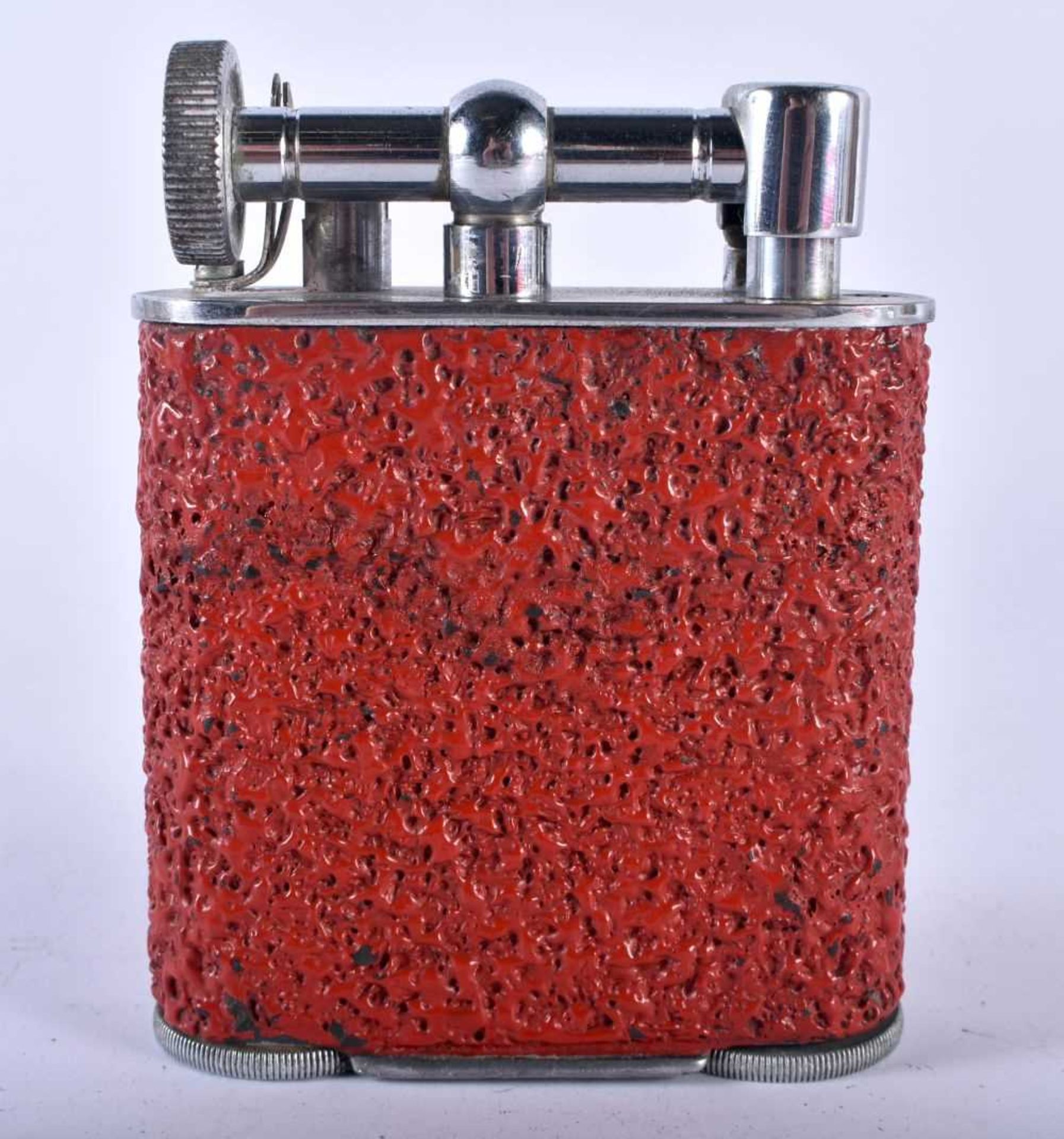 A Dunhill style Jumbo lighter contained in a Mottled Red Texture effect case, patent no.286838.