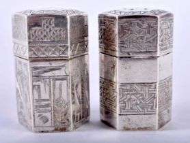 A Pair of Sterling Silver Condiments. Unknown Marks. XRF Tested for purity. 4.5cm x 3cm, weight 92g