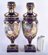 A LARGE PAIR OF 19TH CENTURY FRENCH SEVRES PORCELAIN VASES with jewelled decoration to body, painted