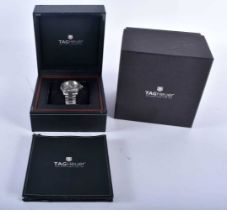A BOXED TAG HEUER WRIST WATCH. 4.25 cm wide inc winder.