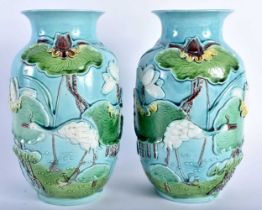A PAIR OF 19TH CENTURY CHINESE BLUE GLAZED PORCELAIN VASES in the manner of Wang Bing Rong. 19 cm