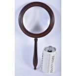 A LARGE ANTIQUE COUNTRY HOUSE MAHOGANY MAGNIFYING MIRROR. 30cm long.