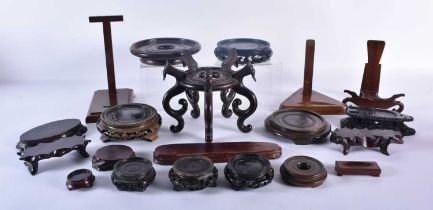 A COLLECTION OF 19TH/20TH CENTURY CARVED HARDWOOD STANDS Late Qing/Republic. (qty)