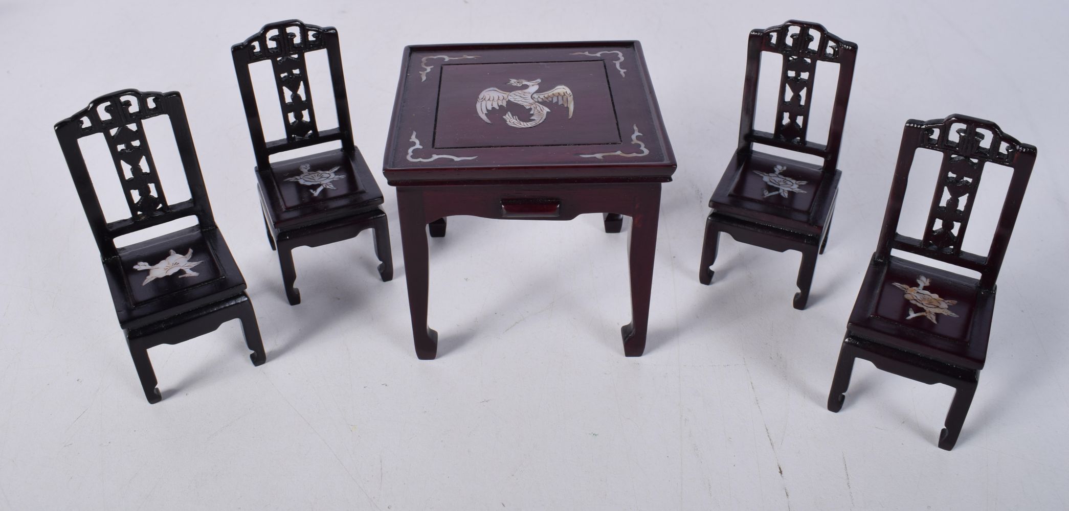 A Chinese miniature hardwood table and chairs with mother of pearl inlay together with a pair of - Image 9 of 10