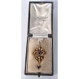 An Antique Gold (poss 15 Carat) Edwardian Pendant set with Pearls and Sapphires in a fitted case.