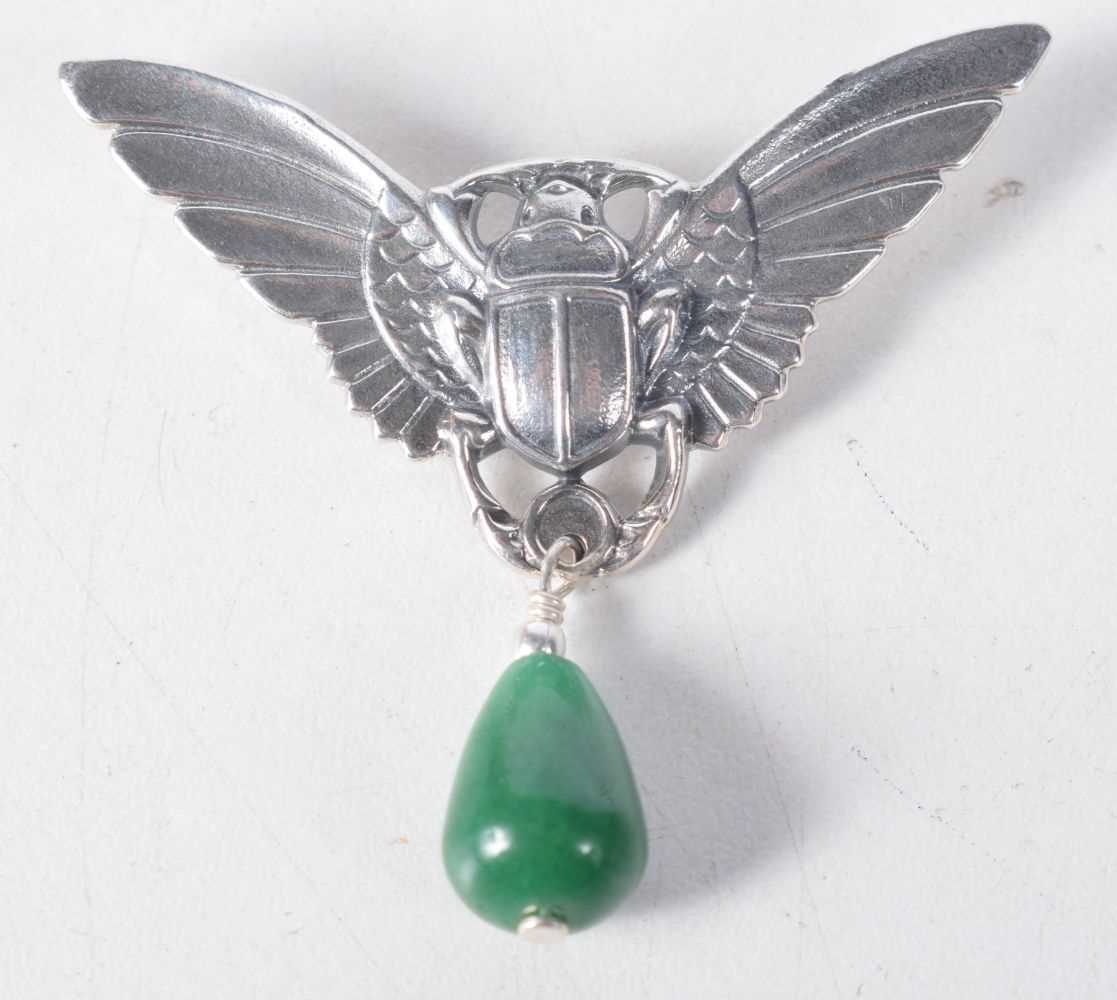 A Silver Winged Beetle Brooch with a Jade Droplet. Stamped Sterling. 5 cm x 4cm, weight 11.8g