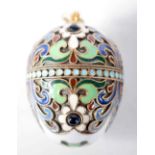 A Sterling Silver Gilt and Enamel Egg Pendant. Stamped 925. 3.4cm x 2.6 cm, weight 14.8g