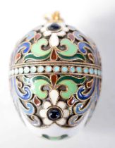 A Sterling Silver Gilt and Enamel Egg Pendant. Stamped 925. 3.4cm x 2.6 cm, weight 14.8g