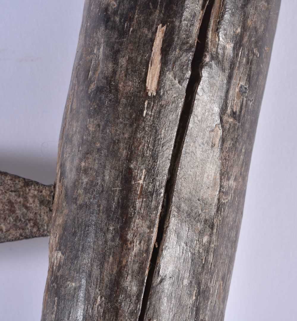 A TRIBAL CARVED WOOD AXE. 55 cm long. - Image 3 of 6