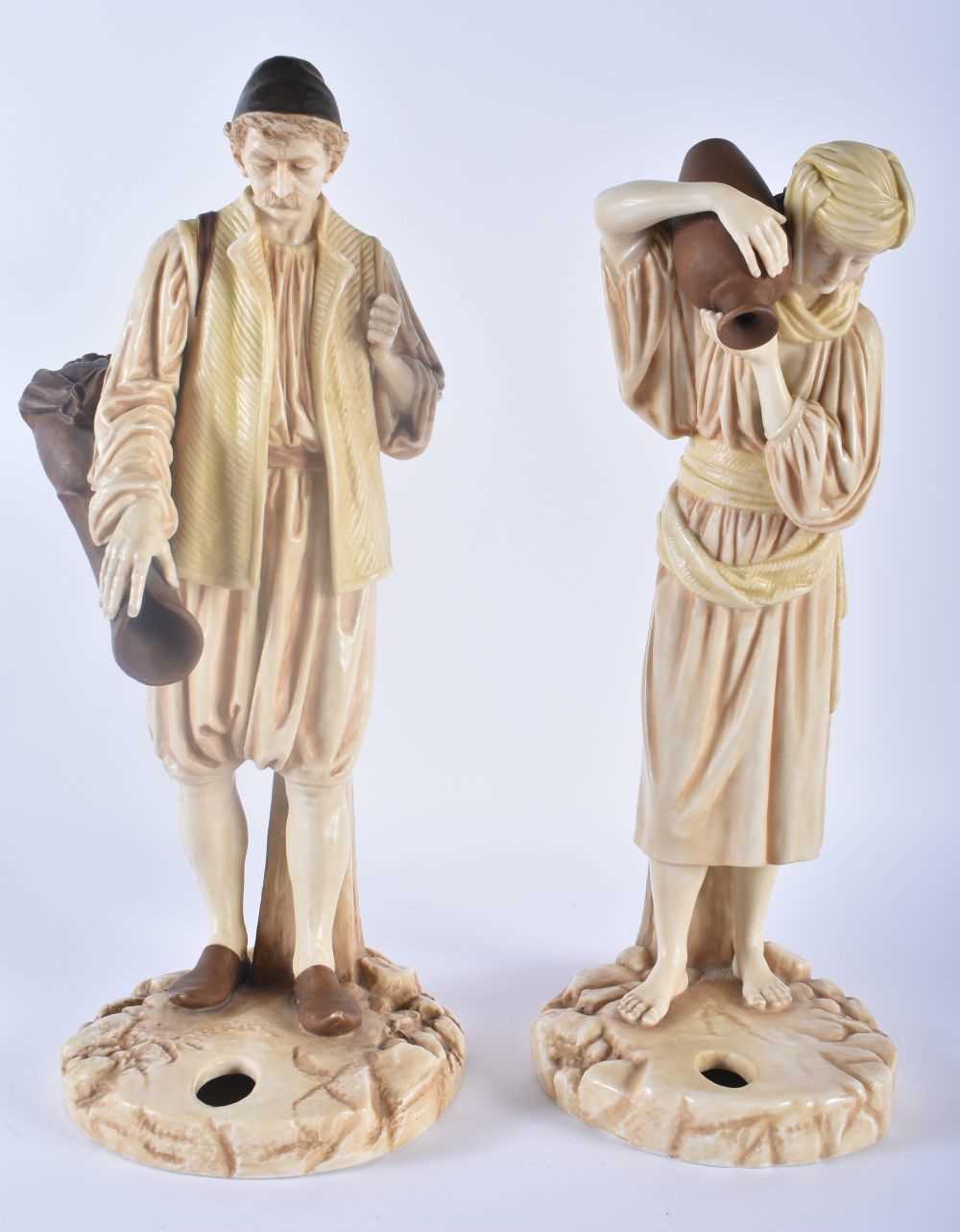 A LARGE PAIR OF 19TH CENTURY ROYAL WORCESTER HADLEYS BLUSH IVORY FIGURES modelled as two male and