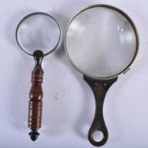 TWO ANTIQUE MAGNIFYING GLASSES. Largest 15 cm long. (2)