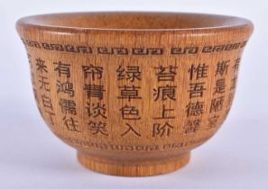 A CHINESE CARVED BUFFALO HORN TYPE CALLIGRAPHY BOWL 20th Century. 213 grams. 9.5 cm wide.