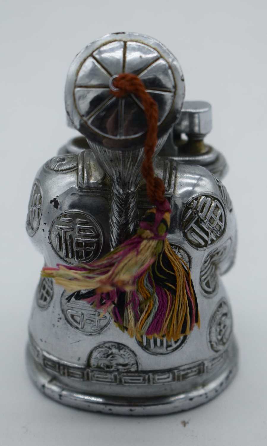 A NOVELTY CHROME SEATED CHINAMAN DRAGON LIGHTER. 209 grams. 9 cm x 5.5 cm. - Image 3 of 4