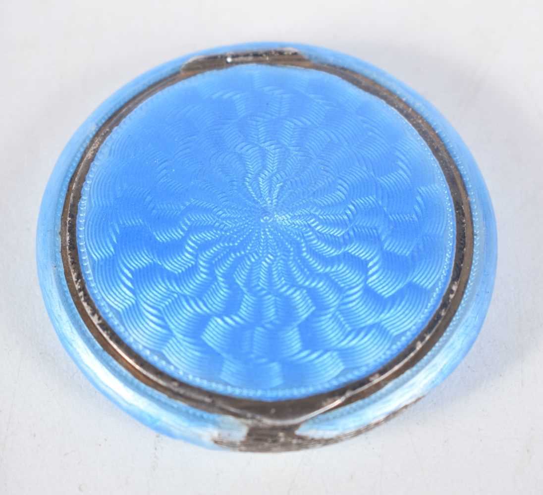 A Silver Gilt and Guilloche Enamel Compact. Stamped Sterling. 5 cm x 1cj, weight 46.7g