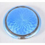 A Silver Gilt and Guilloche Enamel Compact. Stamped Sterling. 5 cm x 1cj, weight 46.7g