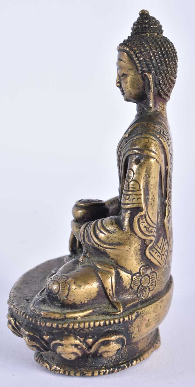A 19TH CENTURY CHINESE BRONZE FIGURE OF A SEATED BUDDHA modelled upon a lotus capped base. 12 cm x 6 - Image 5 of 7
