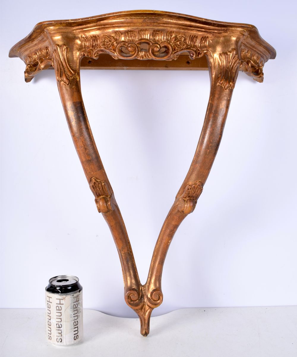 A Gilt wood wall shelf 54 x 54 x 22 cm.