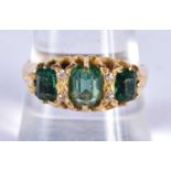 A VICTORIAN 18CT GOLD EMERALD AND DIAMOND RING. R. 4.3 grams.