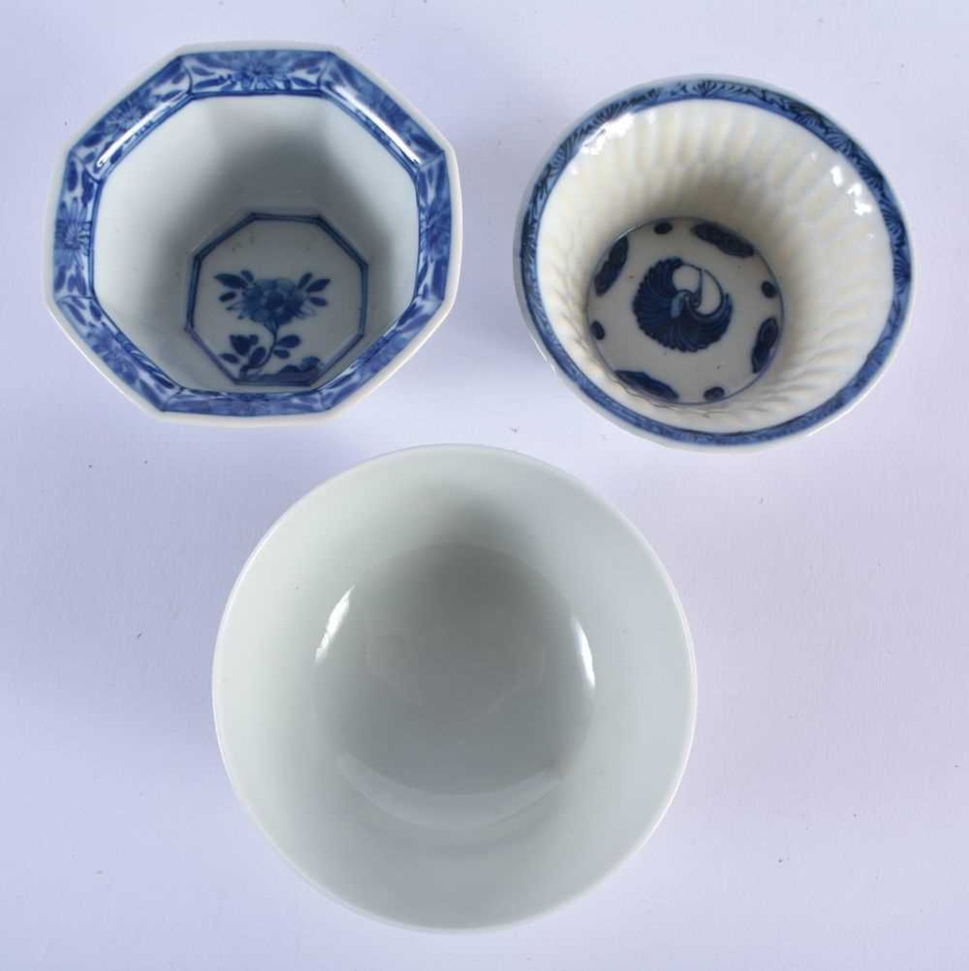 TWO CHINESE QING DYNASTY BLUE AND WHITE TEABOWLS together with another. Largest 9.5 cm diameter. ( - Image 3 of 4