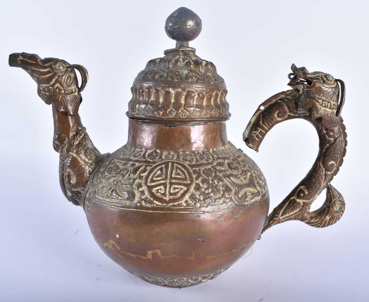 A 19TH CENTURY TIBETAN COPPER TEAPOT AND COVER decorated with repousse figures and foliage. 23 cm - Image 3 of 5