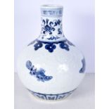 A Chinese porcelain blue and white vase decorated in relief with fish and Algae in relief 27 cm.