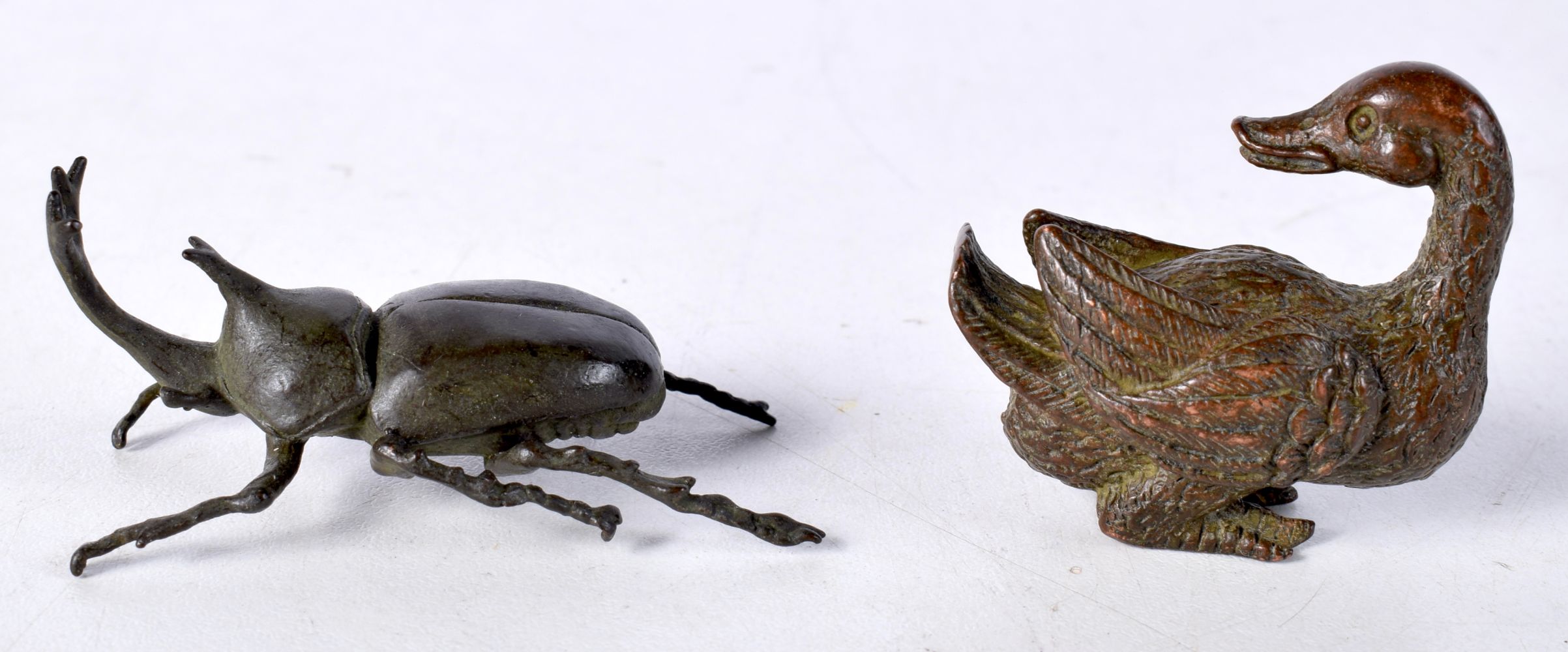 A Japanese bronze Rhinoceros Beetle together with a duck cm (2). - Image 4 of 4