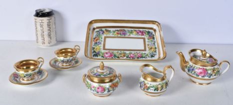 A small 19th Century Paris porcelain tea set largest 23 x 15.5 cm (8)