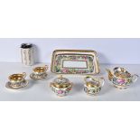 A small 19th Century Paris porcelain tea set largest 23 x 15.5 cm (8)