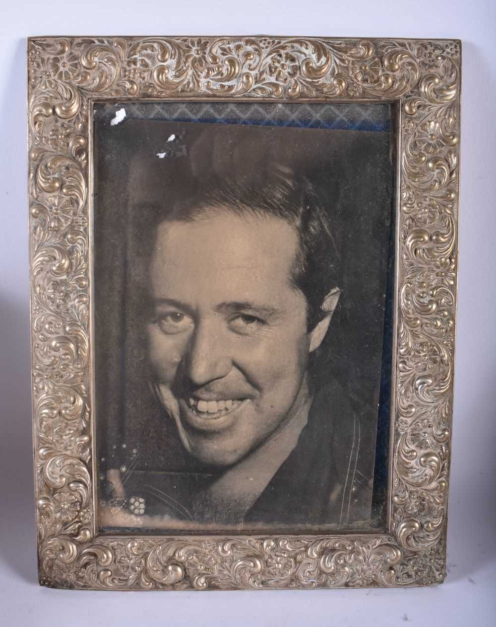 AN ANTIQUE SILVER PHOTOGRAPH FRAME together with another repousse frame & a pair of Russian cup - Image 2 of 5