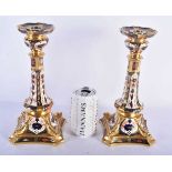 A LARGE PAIR OF ROYAL CROWN DERBY IMARI CANDLESTICKS. 27 cm high.