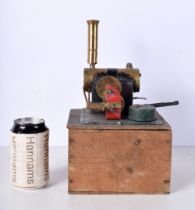 A vintage model steam engine 11 x 16cm.