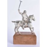 AN ANTIQUE SILVER PLATED AND PINE POLO PLAYER FIGURE. 794 grams. 19 cm x 10 cm.