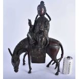 A LARGE 19TH CENTURY CHINESE CHAMPLEVE ENAMEL BRONZE FIGURE Qing, modelled as an immortal upon a