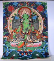 A Tibetan silk Tanka on paper 90 x 66 cm