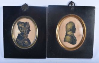 A PAIR OF REGENCY FRAMED SILHOUETTES. 14 cm x 12 cm.