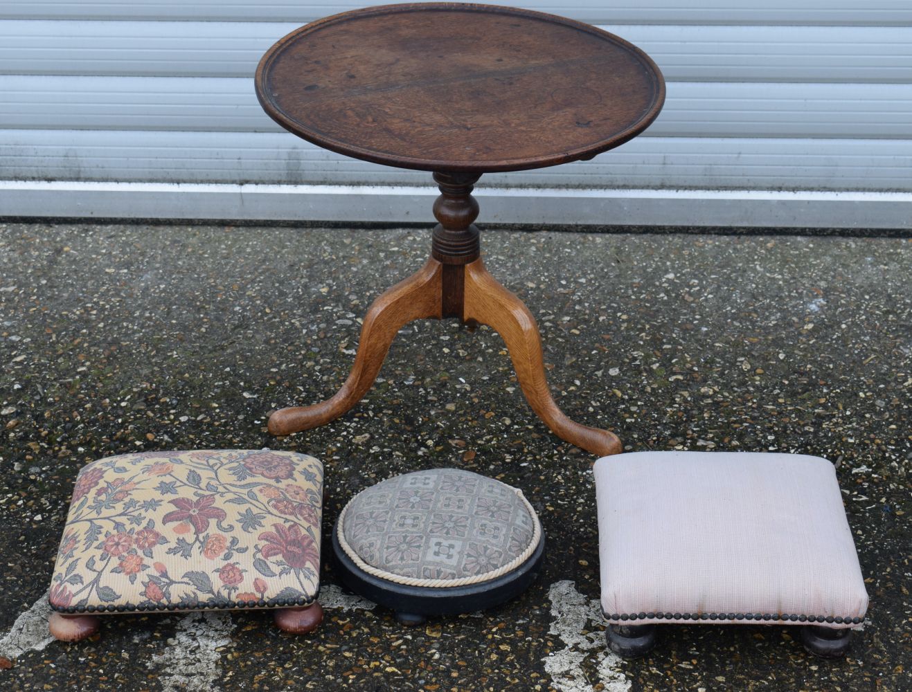 A wooden pedestal tilt top table together with 3 upholstered footstools 50 x 56 cm(4).