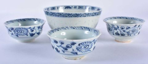A 19TH CENTURY CHINESE BLUE AND WHITE PORCELAIN BOWL Qing, together with three other teabowls.