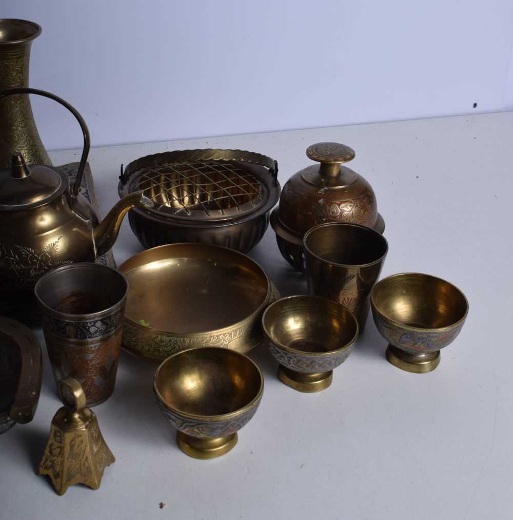 A collection of Central Asian brass items , together with a brass oil lamp with an etched glass - Image 5 of 8