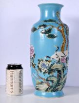 A 20th Century Chinese porcelain vase decorated in relief with birds and trees 34 cm